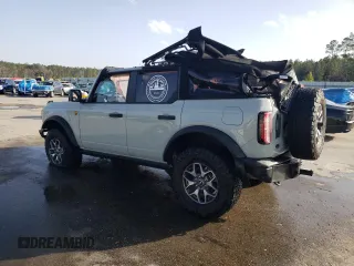 2024 Ford Bronco Badlands z VIN 1FMEE9BP9RLA26173, wystawiony jako Copart lot #47761755 z przebiegiem 2901 mil mil oraz Szkody całkowita. Historia ofert i sprzedaży dostępna na DreamBid. Obrazek 2.