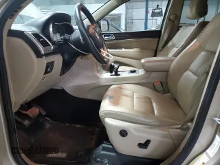 2014 Jeep Grand Cherokee Limited z VIN 1C4RJFBG1EC148908, wystawiony jako Copart lot #54311675 z przebiegiem 90 886 mil mil oraz Szkoda całkowita • Salvage title. Historia ofert i sprzedaży dostępna na DreamBid. Obrazek 7.