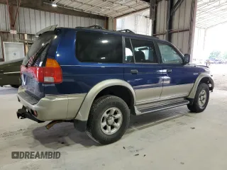 1999 Mitsubishi Montero z VIN JA4MT41R8XP039248, wystawiony jako Copart lot #58486465 z przebiegiem 183 316 mil mil oraz Szkoda całkowita • Salvage title. Historia ofert i sprzedaży dostępna na DreamBid. Obrazek 3.