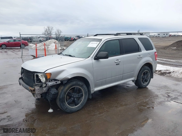 2011 Ford Escape XLT with VIN 1FMCU9D77BKC39013, listed as a IAAI auction lot 41637194 with 183,055 mi miles. Bid and sale history available at carsss.com. Image 2.