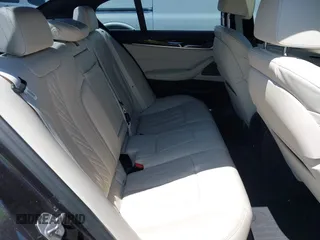 2021 BMW 5 Series 540i xDrive with VIN WBA73BJ02MWW93833, listed as a IAAI auction lot 42160043 with 59,779 mi miles and . Bid and sale history available at DreamBid. Image 8.