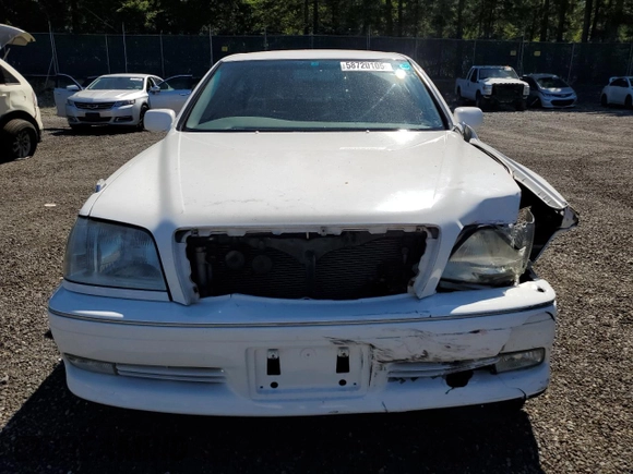 1999 Toyota Crown z VIN JZS1790001672, wystawiony jako Copart lot #58720105 z przebiegiem 101 572 mil mil oraz Szkoda całkowita • Salvage title. Historia ofert i sprzedaży dostępna na DreamBid. Obrazek 5.