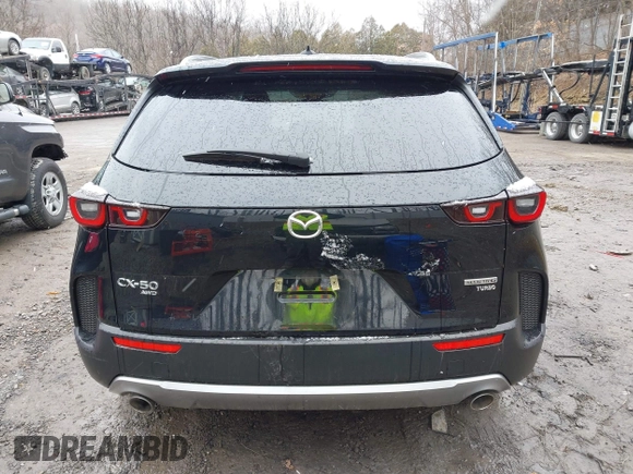 2024 Mazda CX-50 Premium z VIN 7MMVABDYXRN180263, wystawiony jako IAAI lot #41738791 z przebiegiem 9 688 mil mil oraz . Historia ofert i sprzedaży dostępna na DreamBid. Obrazek 16.