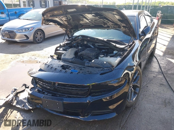 2023 Dodge Charger SXT z VIN 2C3CDXBG6PH598948, wystawiony jako IAAI lot #42171370 z przebiegiem 22 914 mil mil oraz . Historia ofert i sprzedaży dostępna na DreamBid. Obrazek 6.