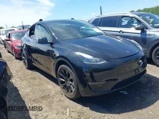 2022 Tesla Model Y Long Range z VIN 7SAYGDEE4NA006645, wystawiony jako IAAI lot #42192495 z przebiegiem 28 784 mil mil oraz . Historia ofert i sprzedaży dostępna na DreamBid. Obrazek 1.