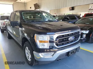 2021 Ford F-150 XL with VIN 1FTFW1E52MFB64744, listed as a IAAI auction lot 42733866 with 98,411 mi miles and . Bid and sale history available at DreamBid. Image 18.