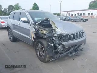2021 Jeep Grand Cherokee Limited z VIN 1C4RJFBG2MC612156, wystawiony jako IAAI lot #42068461 z przebiegiem 99 675 mil mil oraz . Historia ofert i sprzedaży dostępna na DreamBid. Obrazek 1.