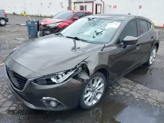 2014 Mazda 3 S Grand Touring with VIN JM1BM1M3XE1164610, listed as a IAAI auction lot 42421946 with 96,591 mi miles and . Bid and sale history available at DreamBid. Image 6.