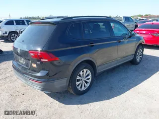 2018 Volkswagen Tiguan S with VIN 3VV1B7AX6JM036407, listed as a IAAI auction lot 41705021 with 84,171 mi miles. Bid and sale history available at carsss.com. Image 4.