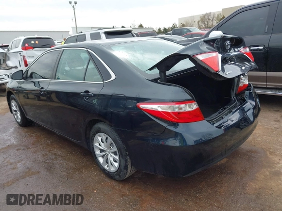 2015 Toyota Camry XLE with VIN 4T4BF1FK9FR450447, listed as a IAAI auction lot 41771512 with 218,691 mi miles and . Bid and sale history available at DreamBid. Image 3.