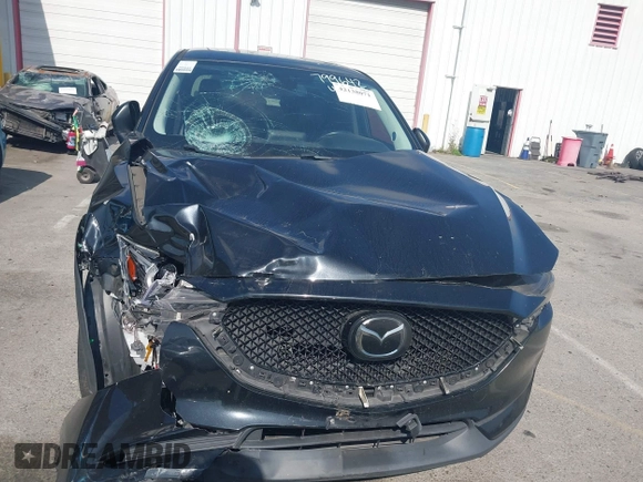2019 Mazda CX-5 Grand Touring with VIN JM3KFADMXK1547727, listed as a IAAI auction lot 42138071 with Not provided miles and . Bid and sale history available at DreamBid. Image 12.