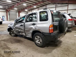 2004 Suzuki Vitara JX z VIN 2S3TD52V546100133, wystawiony jako Copart lot #72629154 z przebiegiem 186 597 mil mil oraz Tytuł czysty. Historia ofert i sprzedaży dostępna na DreamBid. Obrazek 2.