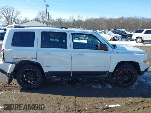 2014 Jeep Patriot Limited with VIN 1C4NJRCB5ED634120, listed as a IAAI auction lot 41394366 with 139,859 mi miles. Bid and sale history available at carsss.com. Image 13.