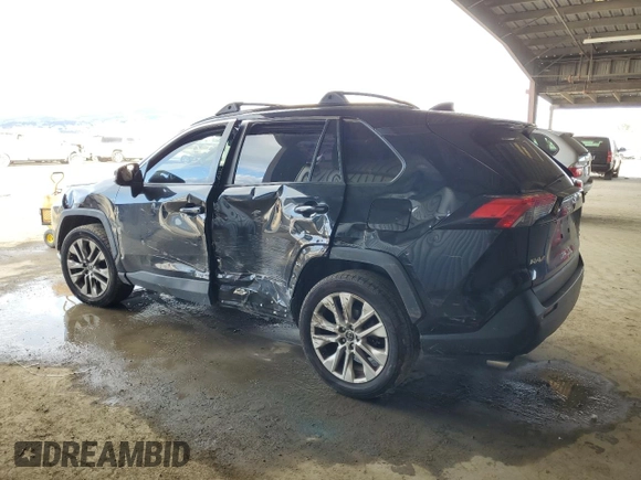 2019 Toyota RAV4 XLE Premium with VIN JTMA1RFV5KD026145, listed as a Copart auction lot 48238125 with 101,443 mi miles and Salvage Title. Bid and sale history available at carsss.com. Image 2.