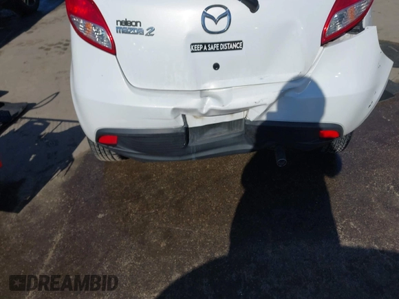 2012 Mazda 2 Touring z VIN JM1DE1LY2C0134281, wystawiony jako IAAI lot #41613690 z przebiegiem 156 546 mil mil oraz . Historia ofert i sprzedaży dostępna na DreamBid. Obrazek 16.