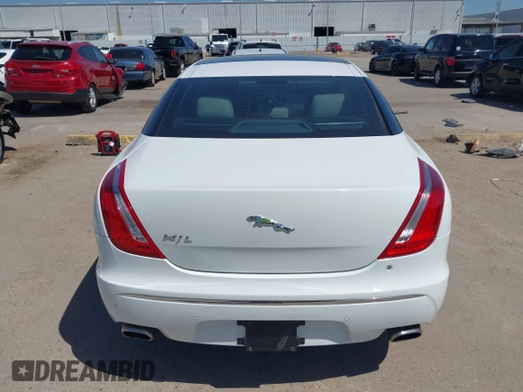 2012 Jaguar XJ XJL with VIN SAJWA2GB3CLV38500, listed as a IAAI auction lot 41990409 with 73,793 mi miles and . Bid and sale history available at DreamBid. Image 16.