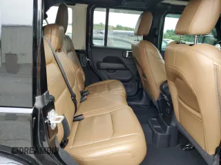 2021 Jeep Wrangler Unlimited Sahara High Altitude with VIN 1C4HJXEM9MW585183, listed as a Copart auction lot 71749574 with 21,526 mi miles and Salvage title. Bid and sale history available at DreamBid. Image 11.