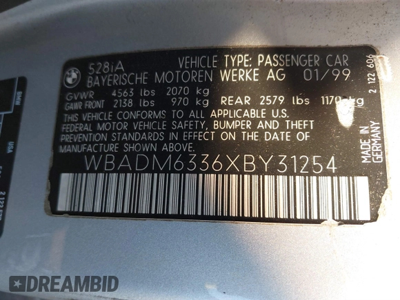 1999 BMW 5 Series 528iA with VIN WBADM6336XBY31254, listed as a IAAI auction lot 41408089 with 221,176 mi miles. Bid and sale history available at carsss.com. Image 9.