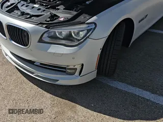 2013 BMW 7 Series 750i xDrive с VIN WBAYB6C51DDS16345, выставлен на аукционе Copart как лот 64604525 с пробегом 115 128 миль миль и Чистый • Clean title. История ставок и продаж доступна на DreamBid. Изображение 13.