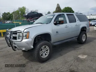 2012 Chevrolet Suburban LT with VIN 1GNSKJE77CR186349, listed as a Copart auction lot 59309105 with Not provided miles and Salvage title. Bid and sale history available at DreamBid. Image 1.