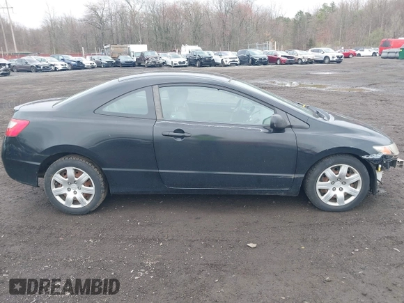 2010 Honda Civic Cpe LX with VIN 2HGFG1B65AH506256, listed as a IAAI auction lot 41942862 with 142,683 mi miles. Bid and sale history available at carsss.com. Image 13.
