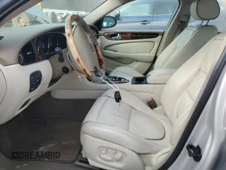 2004 Jaguar XJ with VIN SAJEA74C64SG08121, listed as a Copart auction lot 81736984 with 100,144 mi miles and Non Repairable. Bid and sale history available at DreamBid. Image 7.