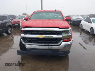 2018 Chevrolet Silverado 1500 LT with VIN 1GCRCREC1JZ342110, listed as a IAAI auction lot 41194372 with 73,186 mi miles and . Bid and sale history available at DreamBid. Image 13.