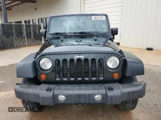 2012 Jeep Wrangler Unlimited Sport z VIN 1C4BJWDG3CL181596, wystawiony jako Copart lot #57940655 z przebiegiem 168 882 mil mil oraz Czysty tytuł • Clean title. Historia ofert i sprzedaży dostępna na DreamBid. Obrazek 5.