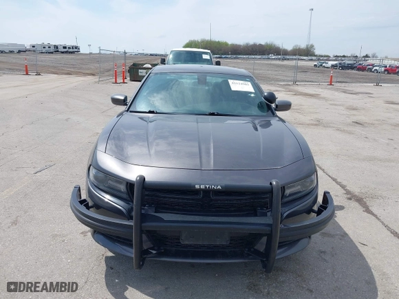 2020 Dodge Charger Police with VIN 2C3CDXKT3LH112023, listed as a IAAI auction lot 42124903 with 130,738 mi miles. Bid and sale history available at carsss.com. Image 6.