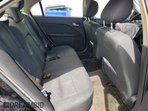 2012 Ford Fusion SE z VIN 3FAHP0HGXCR117692, wystawiony jako Copart lot #56026555 z przebiegiem 236 669 mil mil oraz Szkoda całkowita • Salvage title. Historia ofert i sprzedaży dostępna na DreamBid. Obrazek 10.