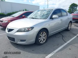 2008 Mazda 3 Sport with VIN JM1BK12F481802020, listed as a IAAI auction lot 42196378 with 163,983 mi miles and . Bid and sale history available at DreamBid. Image 2.