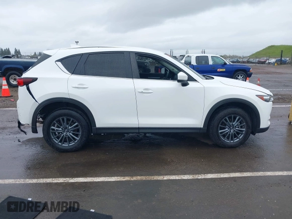 2020 Mazda CX-5 Touring with VIN JM3KFACM0L0738615, listed as a IAAI auction lot 41923923 with 52,599 mi miles. Bid and sale history available at carsss.com. Image 14.