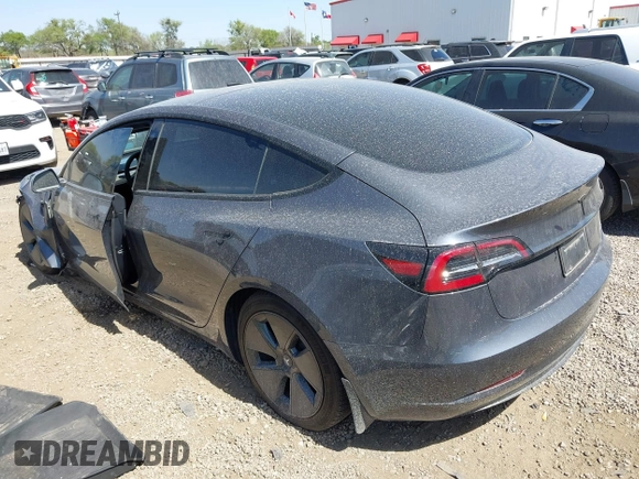 2023 Tesla Model 3 z VIN 5YJ3E1EA2PF569644, wystawiony jako IAAI lot #41831560 z przebiegiem 30 903 mil mil oraz . Historia ofert i sprzedaży dostępna na DreamBid. Obrazek 3.