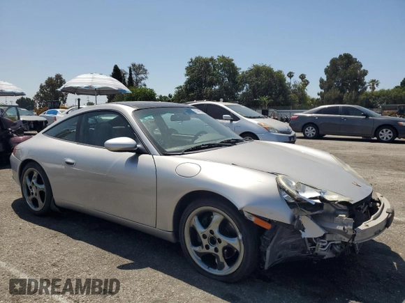 2003 Porsche 911 with VIN WP0BA29923S635457, listed as a Copart auction lot 61446545 with 85,602 mi miles and Salvage title. Bid and sale history available at DreamBid. Image 4.