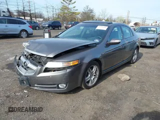 2007 Acura TL with VIN 19UUA662X7A029523, listed as a IAAI auction lot 41946286 with 125,564 mi miles. Bid and sale history available at carsss.com. Image 2.