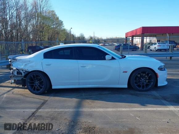 2020 Dodge Charger Scat Pack Widebody z VIN 2C3CDXGJ3LH244092, wystawiony jako IAAI lot #41828294 z przebiegiem 107 568 mil mil oraz . Historia ofert i sprzedaży dostępna na DreamBid. Obrazek 14.