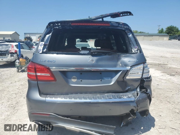 2018 Mercedes-Benz GLS 550 with VIN 4JGDF7DE7JB025977, listed as a Copart auction lot 54705295 with 82,065 mi miles and Salvage title. Bid and sale history available at DreamBid. Image 6.