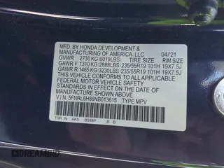 2022 Honda Odyssey Touring z VIN 5FNRL6H86NB013615, wystawiony jako IAAI lot #39139696 z przebiegiem 83 262 mil mil oraz . Historia ofert i sprzedaży dostępna na DreamBid. Obrazek 9.