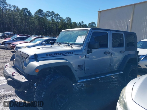 2015 Jeep Wrangler Unlimited Rubicon Hard Rock with VIN 1C4HJWFG2FL587607, listed as a IAAI auction lot 41419237 with 109,719 mi miles and . Bid and sale history available at DreamBid. Image 14.