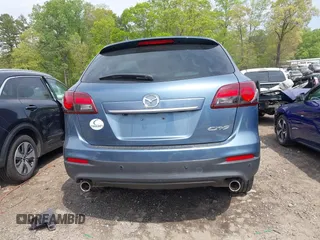 2014 Mazda CX-9 Grand Touring with VIN JM3TB2DA7E0427423, listed as a IAAI auction lot 42006817 with 95,248 mi miles and . Bid and sale history available at DreamBid. Image 17.