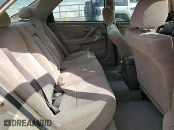 1998 Toyota Camry LE z VIN JT2BF28K4W0114447, wystawiony jako Copart lot #50846275 z przebiegiem 288 989 mil mil oraz Szkoda całkowita • Salvage title. Historia ofert i sprzedaży dostępna na DreamBid. Obrazek 10.