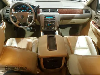2009 GMC Yukon SLT w/4SA with VIN 1GKEC33349R265859, listed as a Copart auction lot 74012784 with 153,394 mi miles and Clean Title. Bid and sale history available at carsss.com. Image 8.