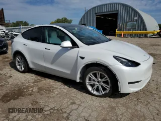 2023 Tesla Model Y Long Range with VIN 7SAYGAEE6PF795434, listed as a Copart auction lot 67507984 with 24,469 mi miles and Salvage Title. Bid and sale history available at DreamBid. Image 4.