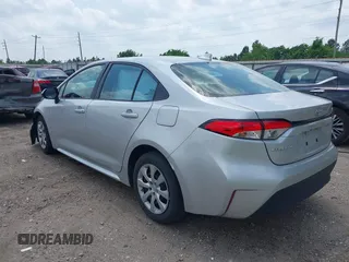 2023 Toyota Corolla LE with VIN 5YFB4MDE7PP015928, listed as a IAAI auction lot 42115319 with 60,434 mi miles. Bid and sale history available at carsss.com. Image 3.