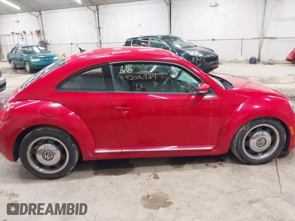 2013 Volkswagen Beetle 2.5L with VIN 3VWJP7AT3DM606135, listed as a IAAI auction lot 42006924 with 78,534 mi miles and . Bid and sale history available at DreamBid. Image 13.