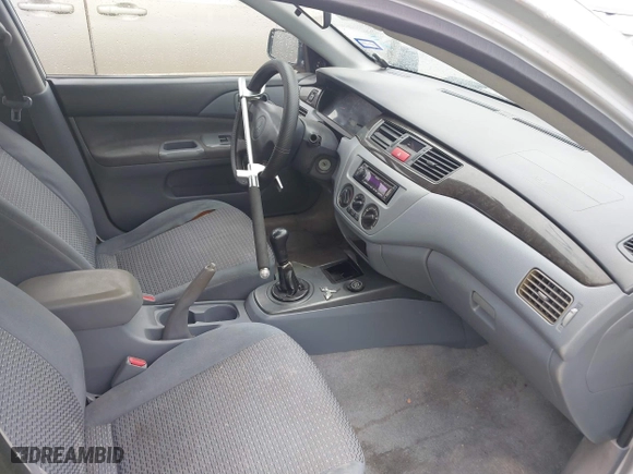 2003 Mitsubishi Lancer ES with VIN JA3AJ26E43U038813, listed as a IAAI auction lot 41778956 with 150,764 mi miles. Bid and sale history available at carsss.com. Image 5.