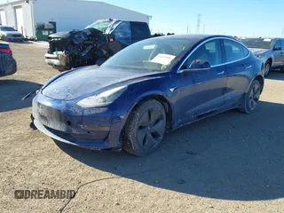 2018 Tesla Model 3 Long Range Battery with VIN 5YJ3E1EA0JF037736, listed as a IAAI auction lot 41423506 with 23,675 mi miles and . Bid and sale history available at DreamBid. Image 2.