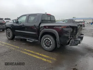 2022 Nissan Frontier Pro-4X z VIN 1N6ED1EK4NN686366, wystawiony jako Copart lot #57396085 z przebiegiem 50 753 mil mil oraz Szkoda całkowita • Salvage title. Historia ofert i sprzedaży dostępna na DreamBid. Obrazek 2.