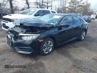 2017 Honda Civic Sedan LX with VIN 19XFC2F51HE224851, listed as a IAAI auction lot 41880127 with 94,934 mi miles. Bid and sale history available at carsss.com. Image 2.