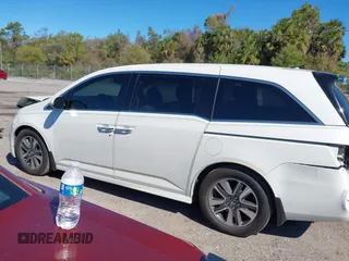 2015 Honda Odyssey Touring Elite with VIN 5FNRL5H96FB090702, listed as a IAAI auction lot 41825889 with 118,157 mi miles and . Bid and sale history available at DreamBid. Image 15.
